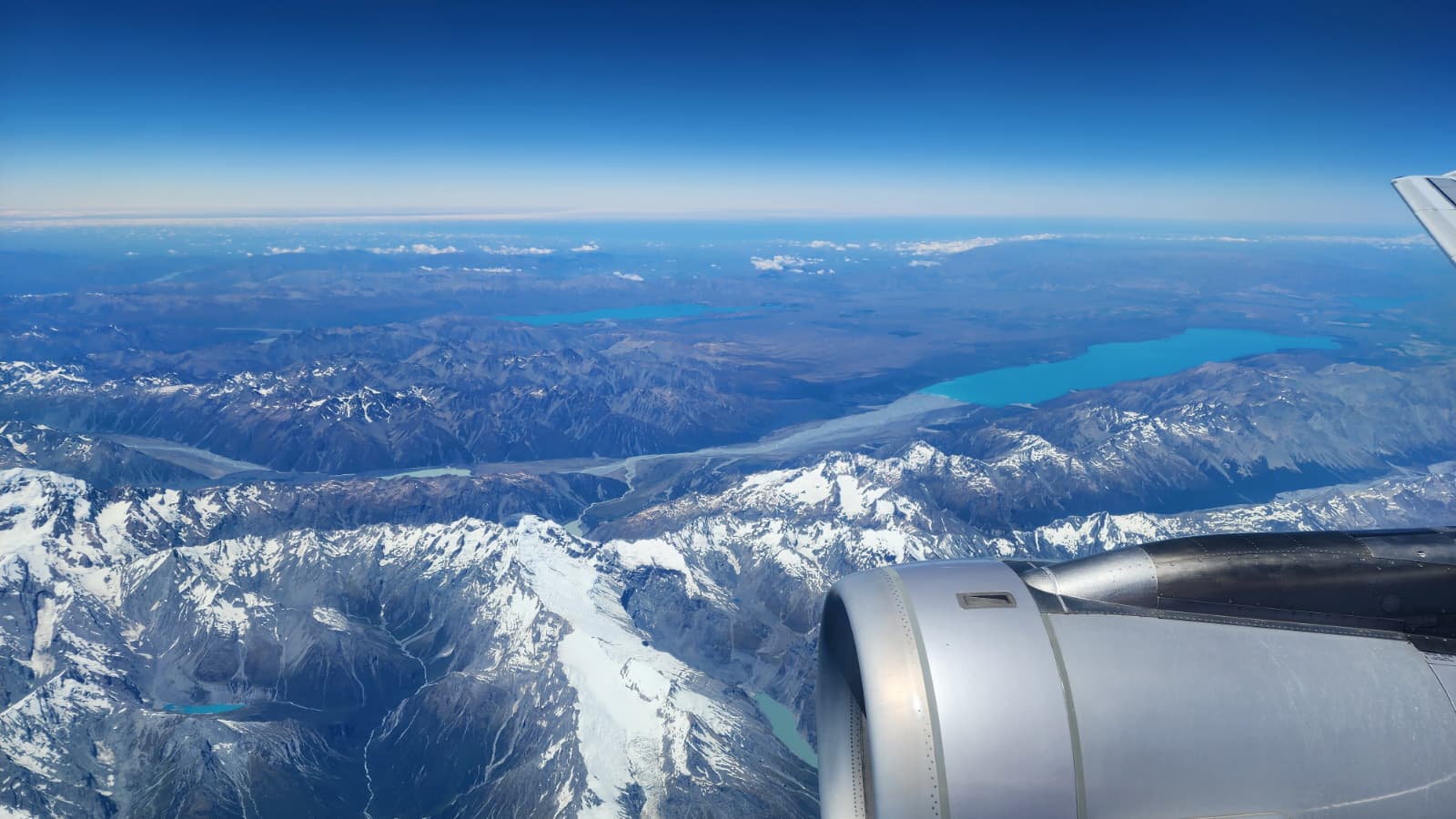 Aerial view of New Zealand mountains from an aircraft window